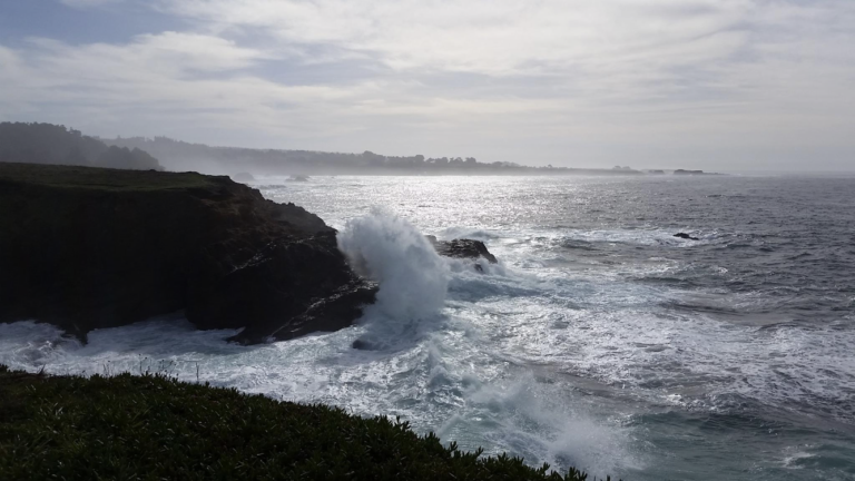Ocean spraying against rocks